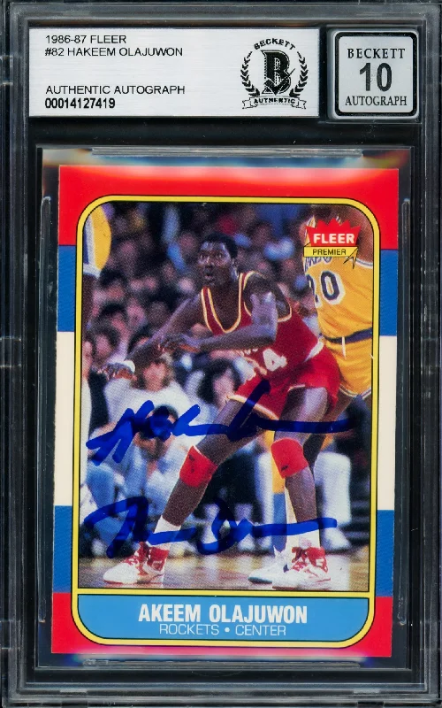 Men's basketball card minimal design -Hakeem Olajuwon Autographed 1986-87 Fleer Rookie Card #82 Houston Rockets Auto Grade Gem Mint 10 "The Dream" Beckett BAS #14127419